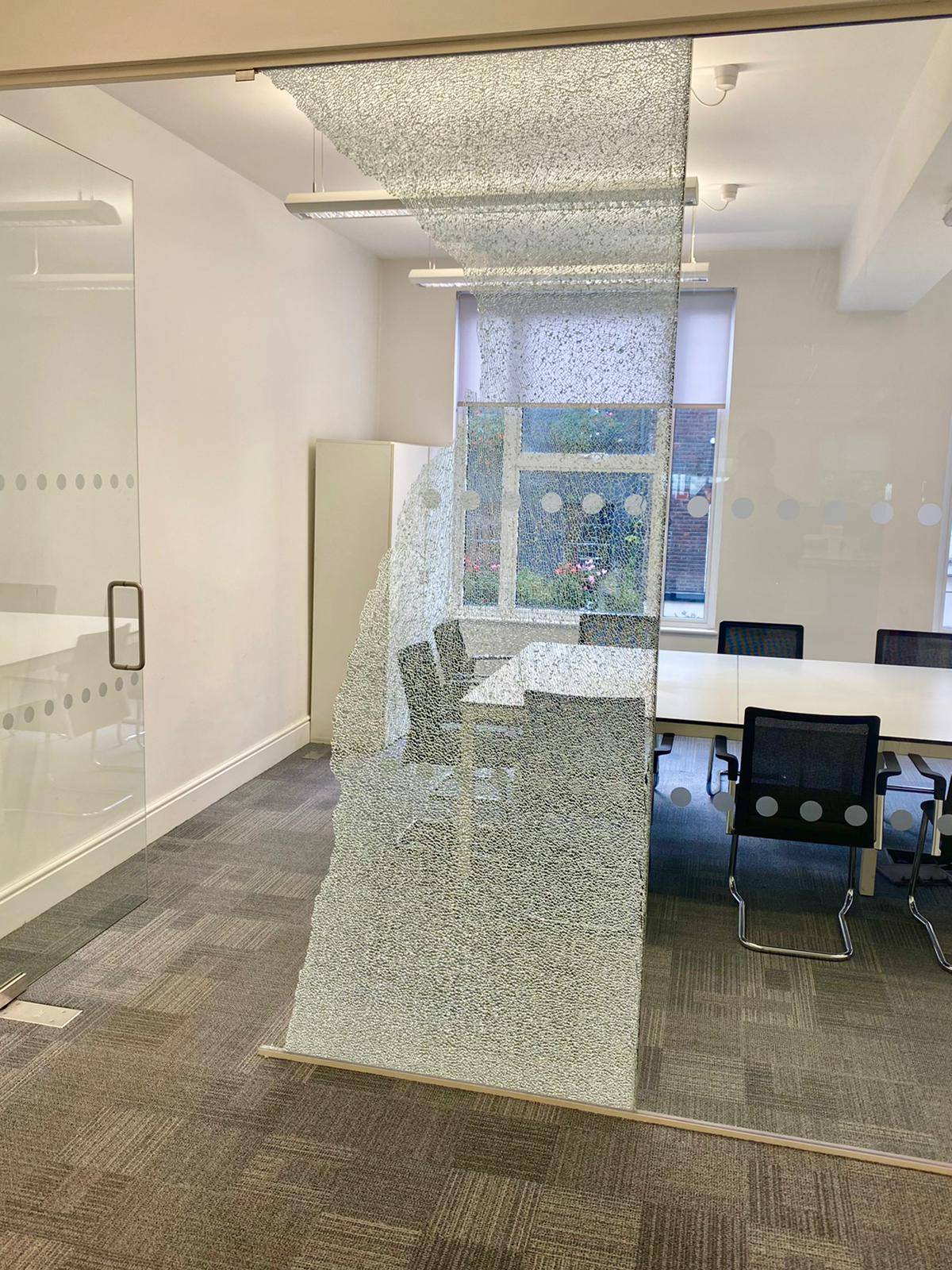 broken glass in the office before the repair