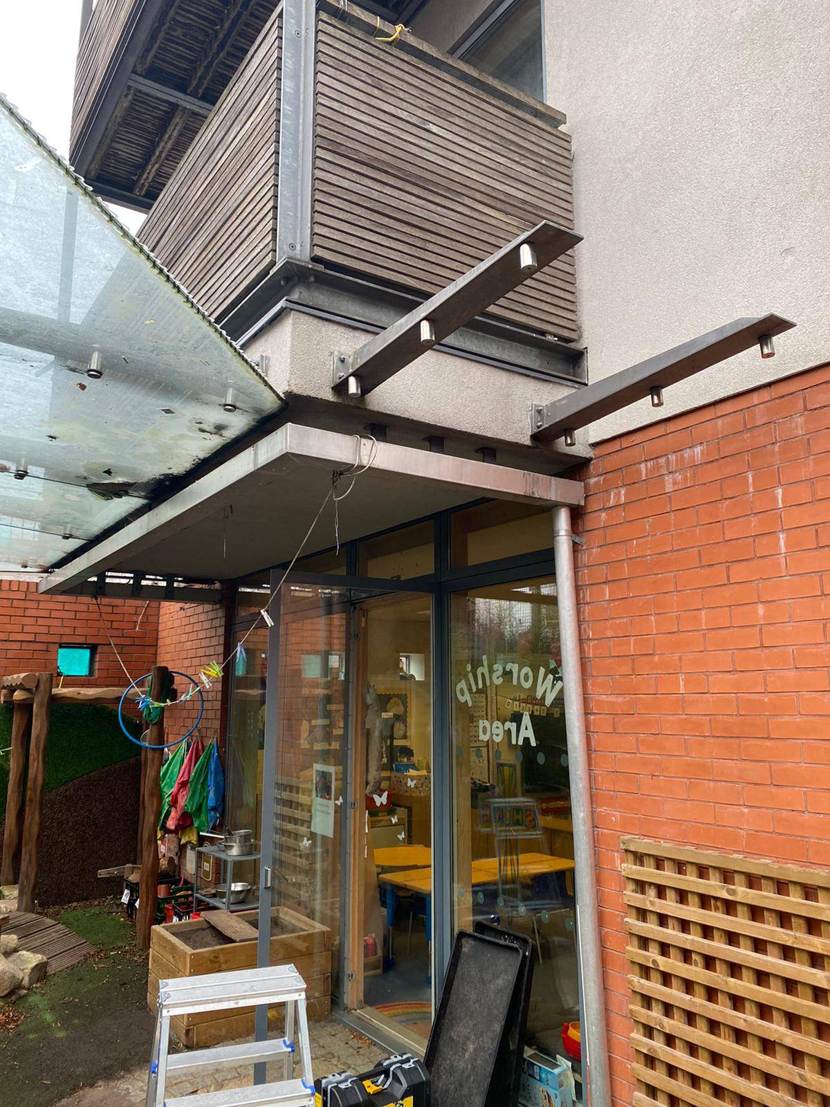 process of changing a glass canopy by glazier London
