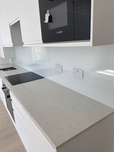 white fresh renovated kitchen installed by local glaziers London