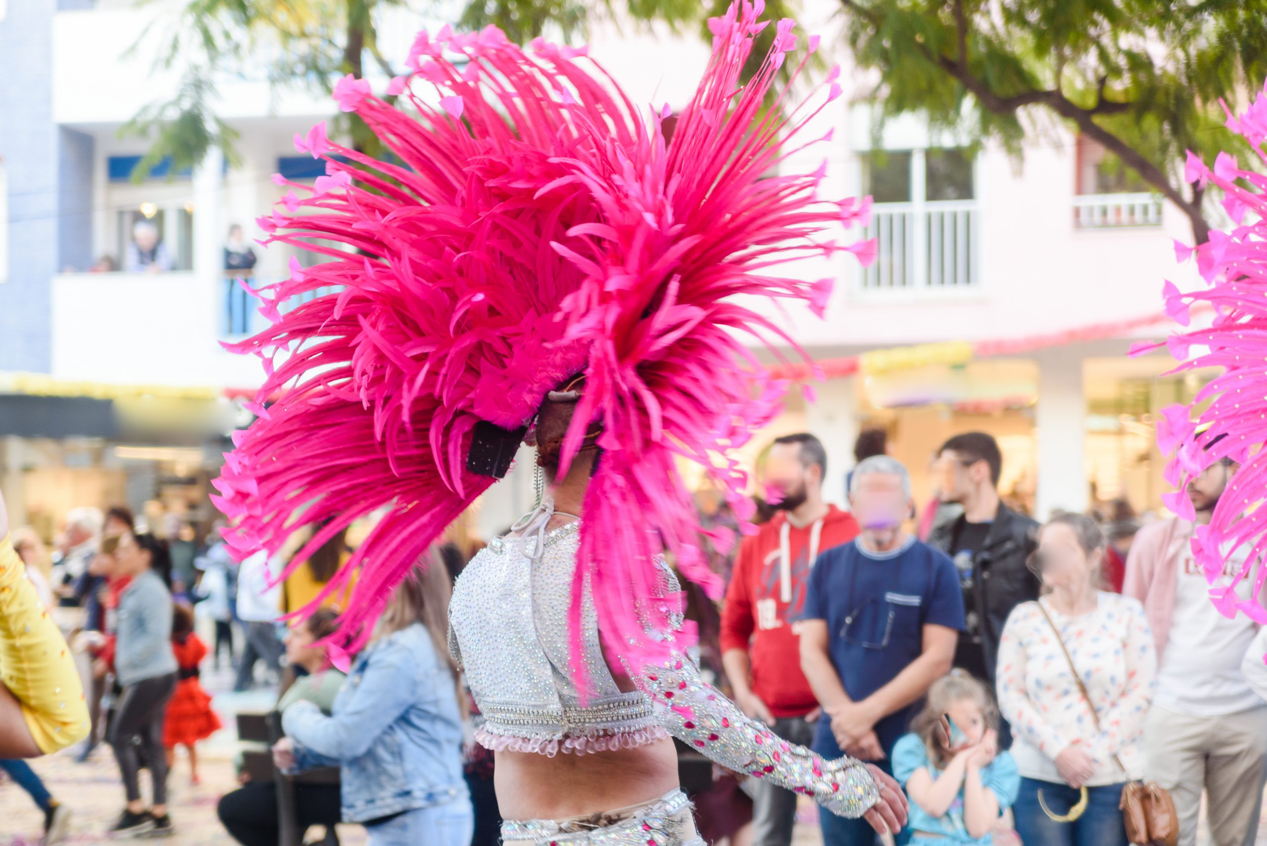 dancers wearing colorful costium at notting hill carnival 2022